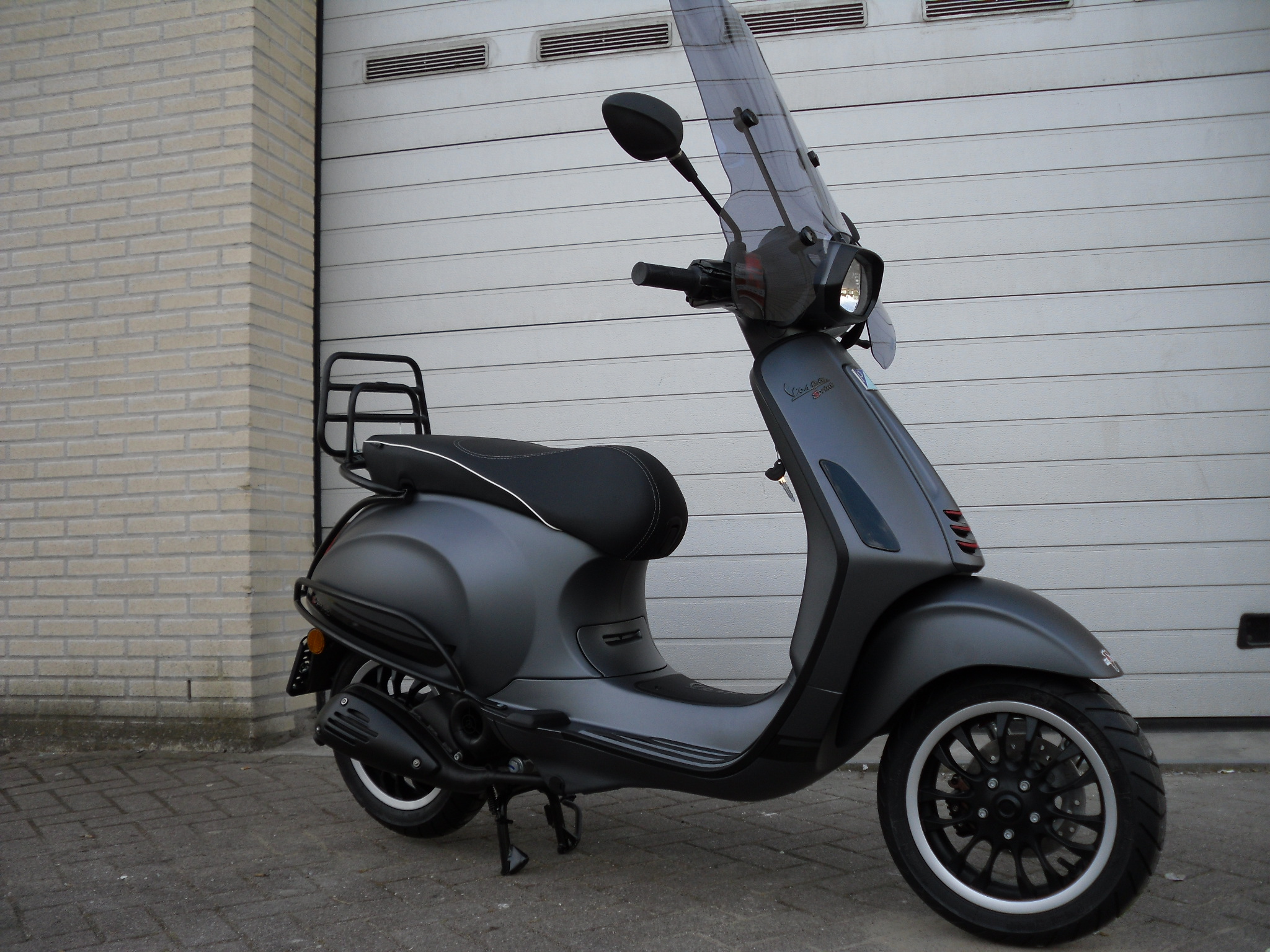 Medisch wangedrag bloemblad Wolf in schaapskleren vespa-sprint-sport-special-mat-titanium-zwart-uitgevoerd den haag