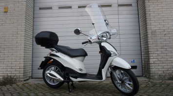 Piaggio Liberty 4T inclusief windscherm en koffer