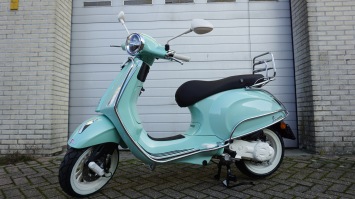 Vespa Primavera Verde Super Special E5+ aanbieding tm 28-2-2026
